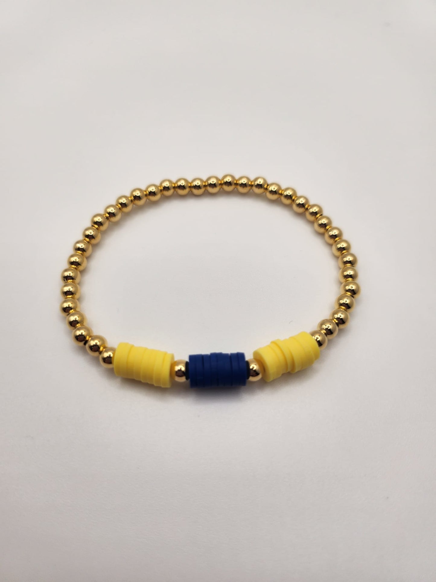 Exclusive Cardinal Newman Bracelet Gold Bead